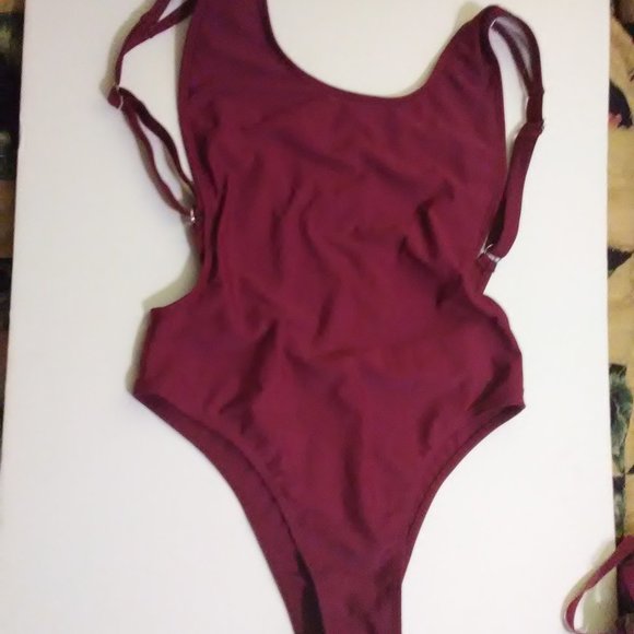 Cheeky One Piece Swimsuit In Fuchsia - Picture 1 of 7